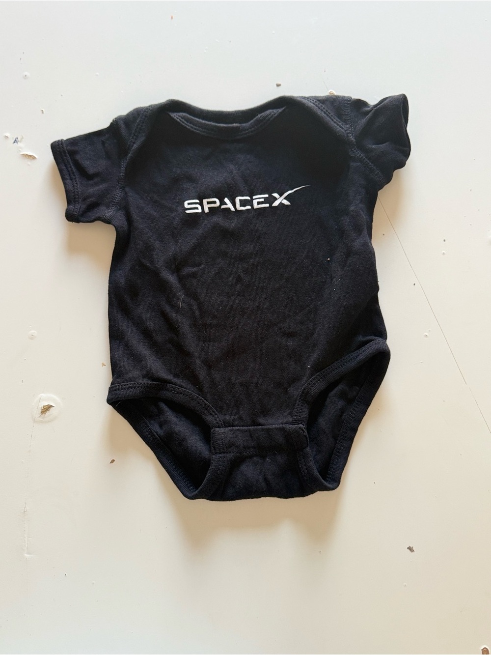 Nike Black Infant One-Piece Bodysuit with White SpaceX Print